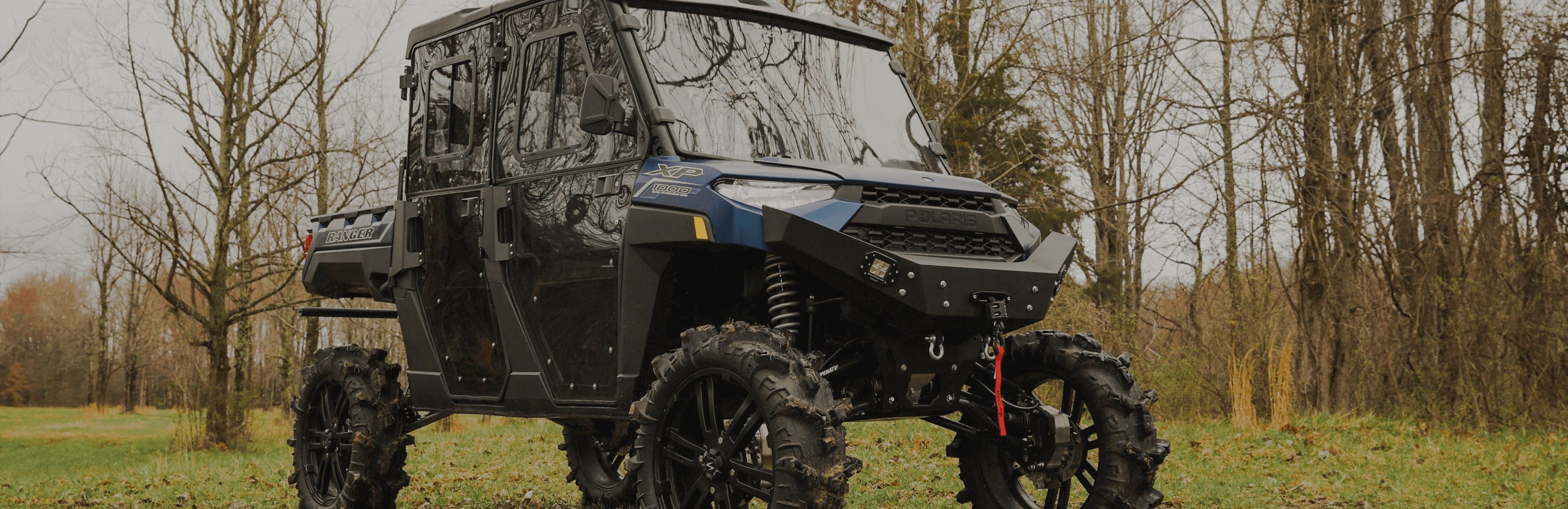 Closeup of Polaris RZR UTV with SuperATV half door installed