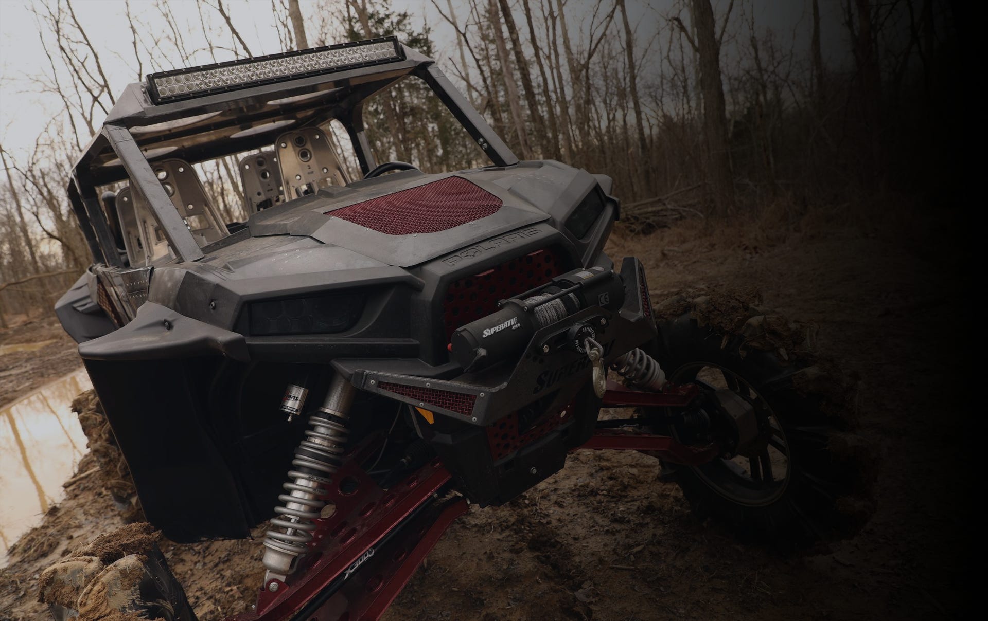 Custom Polaris RZR Depth Finder with GDP Portal Gear Lifts installed in the mud